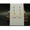 Machine embroidered earrings of a hatching chick popping out of its shell. Silver hypoallergenic hooks.